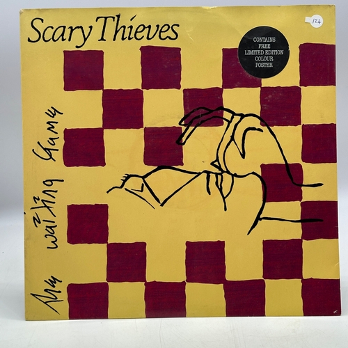 124 - A 12 inch vinyl album by Scary Theives - The Waiting Game, poster pull out included