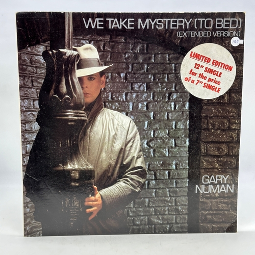 134 - A 12 inch vinyl album by Gary Numan - We TAke Mystery