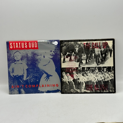 243 - 4x 7 inch single records - Status Quo - Ain't Complaining, Blondie - Union City Blue, Wizzard - Ange... 