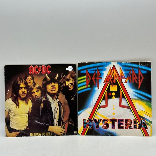 239 - 4x 7 inch single records - ACDC - Highway to Hell, Def Leopard - Hysteria, The Mission - Butterfly o... 