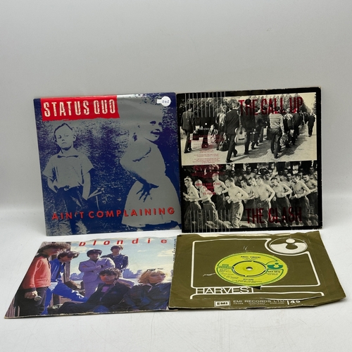 243 - 4x 7 inch single records - Status Quo - Ain't Complaining, Blondie - Union City Blue, Wizzard - Ange... 