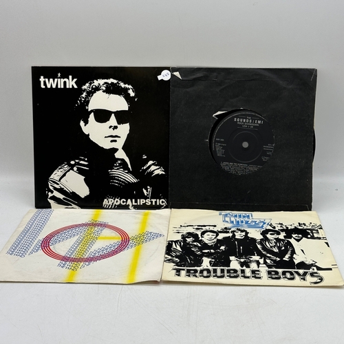 245 - 4x 7 inch single records - Twink - Apocalipstic, The Sounds - Showdown , Thin Lizzy - Trouble Boys, ... 