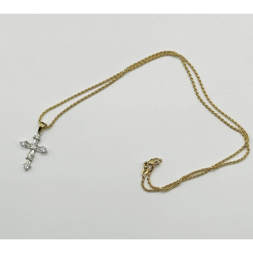1 - An 18ct yellow gold cross pendant & chain, chain is in mint condition, cross is white gold with diam... 