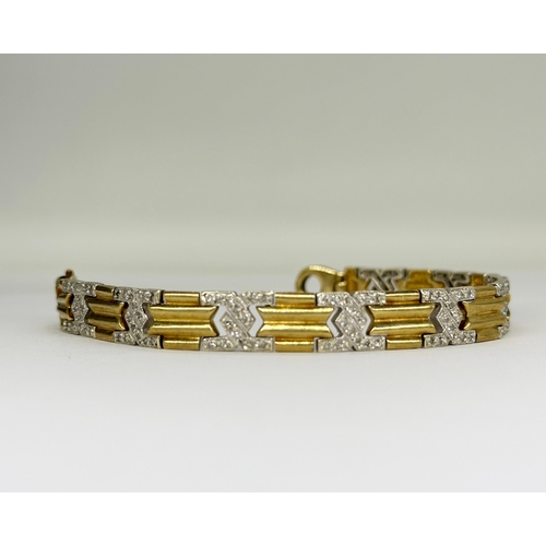 3 - A 9ct yellow gold diamond set bracelet with white gold links, 7 1/2 inches long and 8mm wide, weight... 