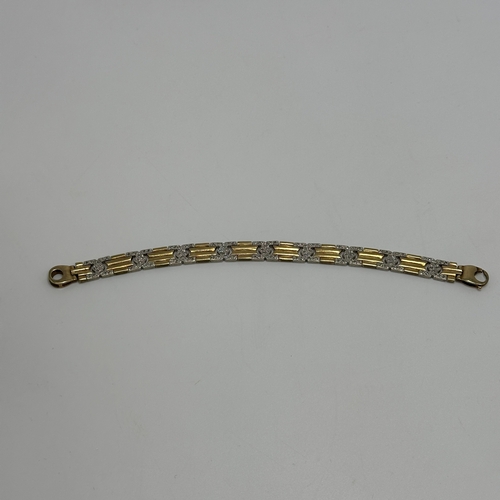 3 - A 9ct yellow gold diamond set bracelet with white gold links, 7 1/2 inches long and 8mm wide, weight... 