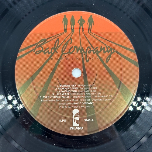 3 - A 12 inch vinyl album by Bad Company - Burning Sky, cover has a few marks on it and some aging, viny... 