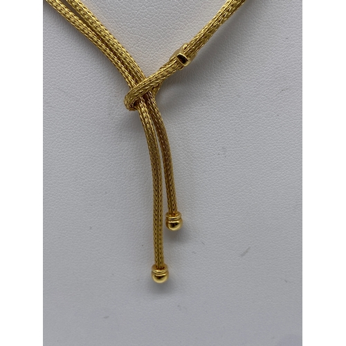 1 - An 18ct yellow gold woven tassel necklace, 11.29grams approx weight, 16 inches long with 1 1/2 inch ... 