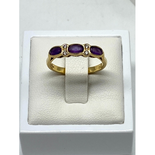 10 - An 18ct yellow gold amethyst & diamond dress ring, 2.9 grams in weight approx, size O