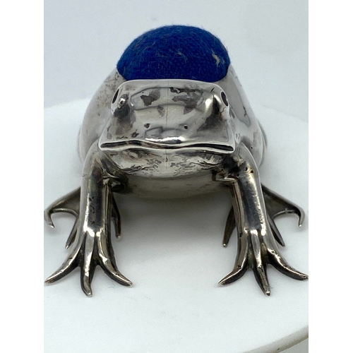 104 - A silver frog pin cushion, Birmingham 1907 Adie & Lovekin ltd, original fabric, silver in excellent ... 