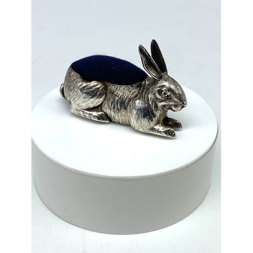 112 - A silver rabbit pin cushion, Birmingham 1908 no visible makers mark but possible Henry Matthews, in ... 