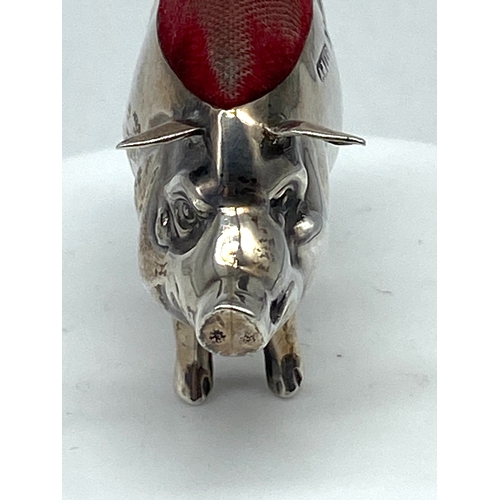 125 - A small silver pig pin cushion, Birmingham 1906 Adie & Lovekin ltd, overall good condition with orig... 