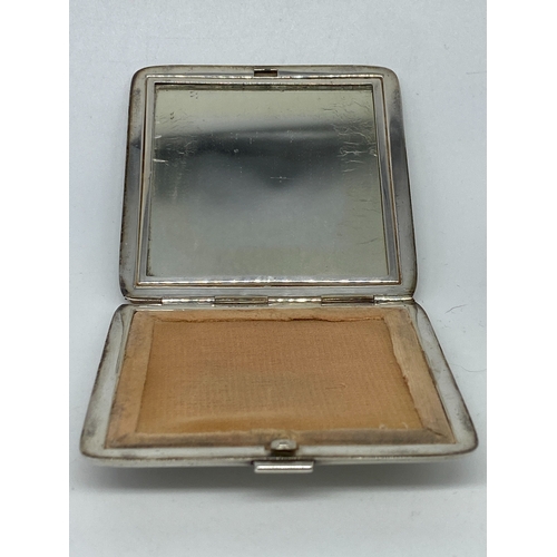 129 - A silver powder compact with porcelain enamel plaque, Birmingham 1937 Harman Brothers, case is in gr... 