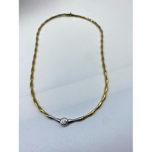 13 - An 18ct yellow gold diamond set necklace, diamond approx 0.25ct, length is 17 inches approx, weight ... 