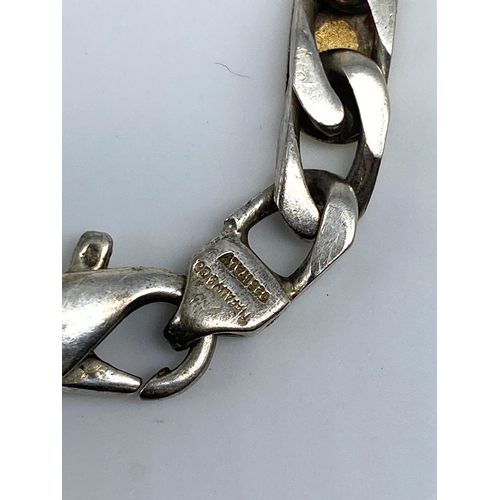 136 - A Tiffany & co silver & gold bracelet, 7 1/4 inches long, 11.4 grams in weight approx