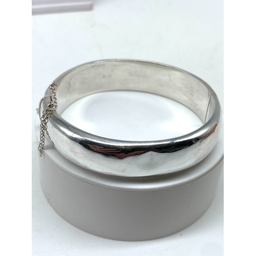 142 - A silver bangle, Birmingham hallmarked, 21.9 grams approx weight