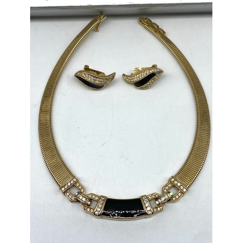 145 - A Christian Dior gold plated necklace, in original box