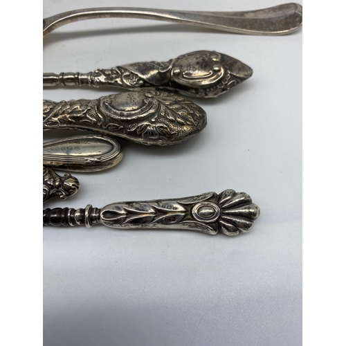 147 - A silver plated laddle, spoon, 4x mixed silver handled button hooks