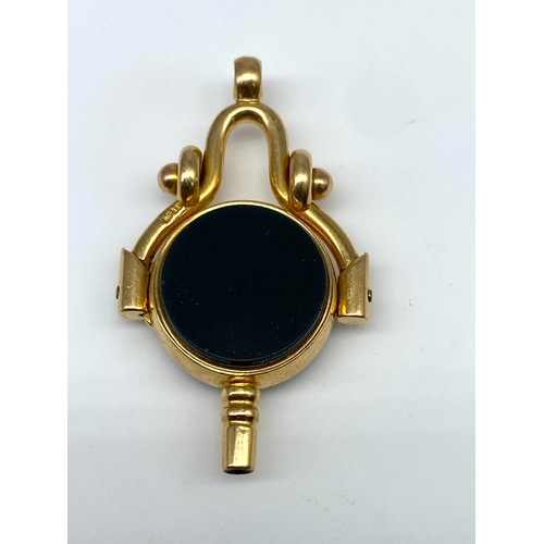 16 - An 18ct yellow gold Victorian watch fob, fully hallmarked, set with a cornellian stone, 27mm x 20mm,... 