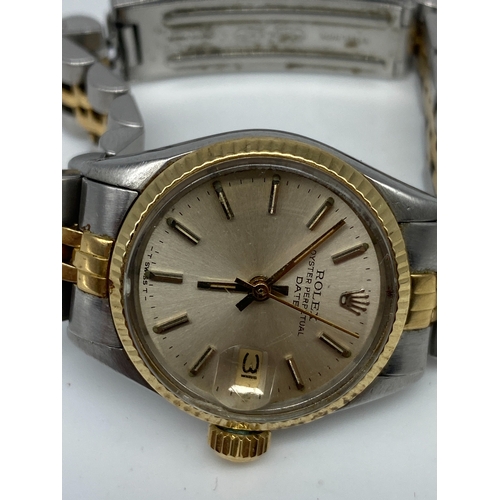 175 - A ladies Oyster Perpetual Rolex watch, stainless steel & gold, working order, no box or papers, stra... 