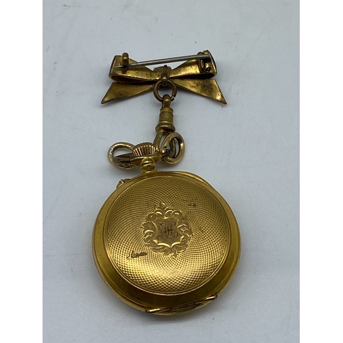 206 - A vintage ladies gold plated pocket watch, 28 mm dial