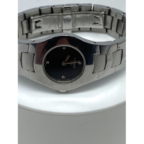 207 - A ladies Tissot diamond dial watch, no box or papers, will require a battery, 23 mm dial