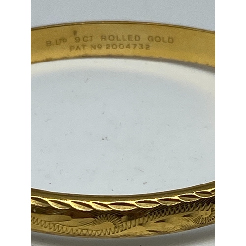 213 - A rolled gold bangle