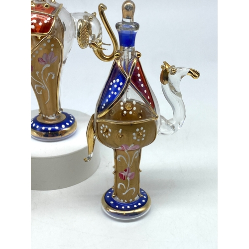 220 - 3x oriental glass scent bottles, 2x camels & an elephant, 6 inches high x 3 1/2 inches high is the l... 