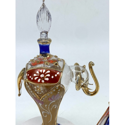 220 - 3x oriental glass scent bottles, 2x camels & an elephant, 6 inches high x 3 1/2 inches high is the l... 