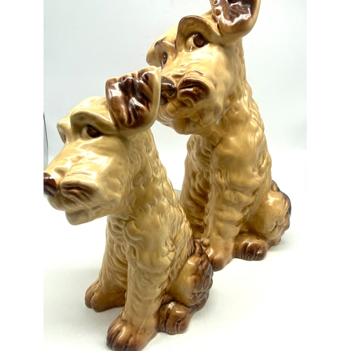 226 - 2x Stlevac dog ornaments, large dog 11 inches x 7 inches, smaller 7 1/2 inches x 4 inches, no chips ... 