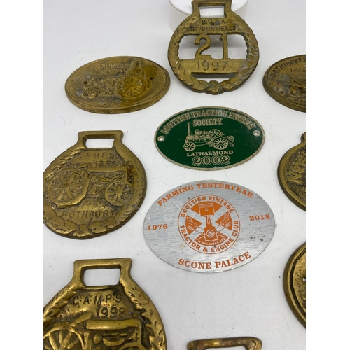 250 - A collection of brass plates