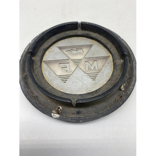 264 - A Massey Ferguson steering wheel centre badge