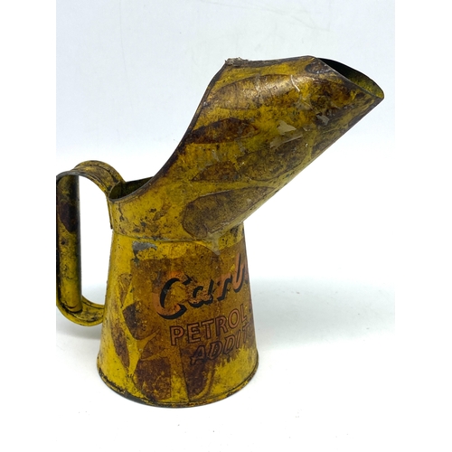 267 - A Carburol petrol & oil can, 7 1/2 inches high x 4 inches wide