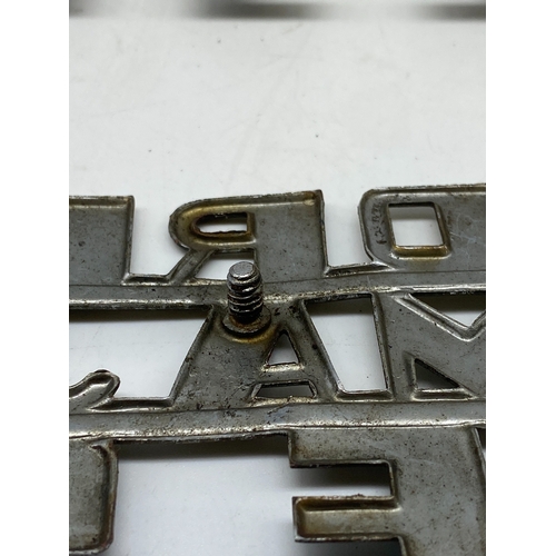 271 - A pair of vintage chrome vintage tractor badges, Fordison major diesel set of bonnet badges