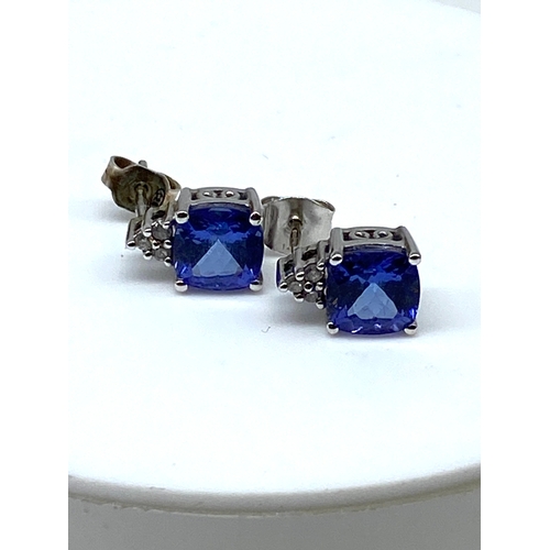 28 - A pair of 14ct white gold tanzanite & diamond earrings, 3.3 grams in weight approx, tanzanite stones... 