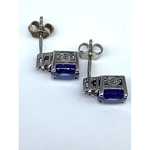 28 - A pair of 14ct white gold tanzanite & diamond earrings, 3.3 grams in weight approx, tanzanite stones... 