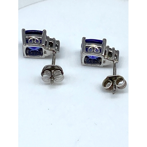 28 - A pair of 14ct white gold tanzanite & diamond earrings, 3.3 grams in weight approx, tanzanite stones... 