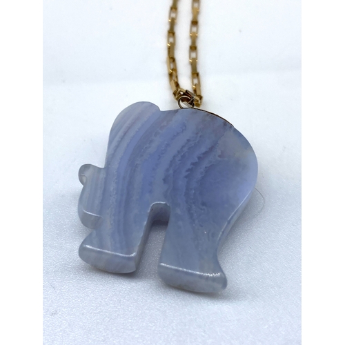 31 - A 9ct yellow gold blue jade pendant & chain,  approx 10 grams total weight, chain is 18 inches long ... 