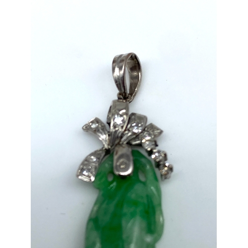 32 - A 9ct white gold jade & diamond pendant, 3.7 grams approx weight, 45mm x 14mm