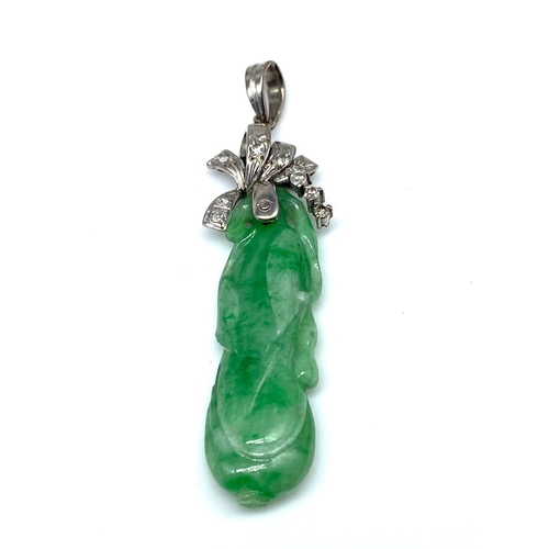 32 - A 9ct white gold jade & diamond pendant, 3.7 grams approx weight, 45mm x 14mm