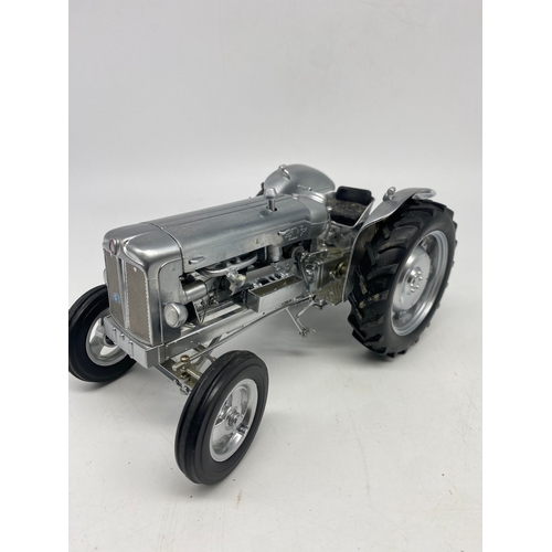 320 - A power Fordson Major 50th Anniversary edition tractor, steering wheel is broken off but present, ex... 