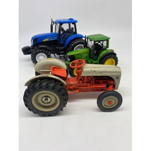 327 - 3x model tractors, a Fergie, a New Holland & a John Deer, these have been played with