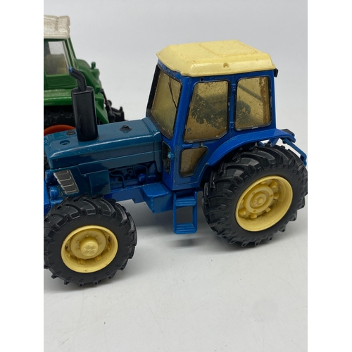 328 - 2x model tractors, a Siku & a Britains, these have been played with