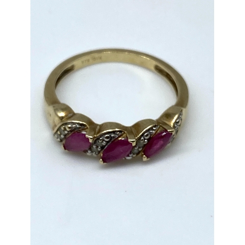 34 - A 9ct yellow gold ruby & diamond dress ring, size L, 2 grams in weight approx