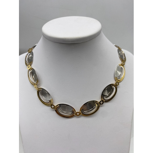 36 - An 18ct yellow & white gold fancy deco style necklace & matching bracelet, 45 grams combined approx ... 