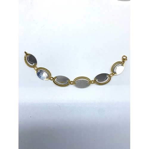 36 - An 18ct yellow & white gold fancy deco style necklace & matching bracelet, 45 grams combined approx ... 