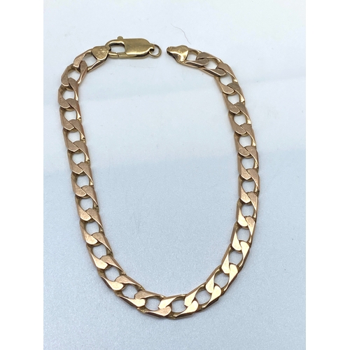 37 - A 9ct yellow gold curb bracelet, 15.4 grams approx weight, will need a solder repair at the trigger,... 