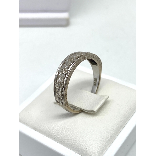 38 - An 18ct white gold diamond dress ring, 3.3 grams approx weight, size N 1/2