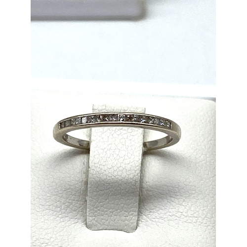 41 - A 9ct white gold eternity band, size J, 1.1 grams in weight approx