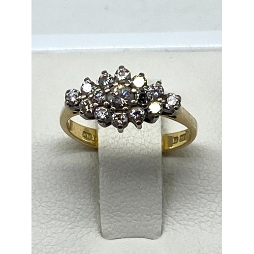 44 - An 18ct yellow gold cluster dress ring, approx 0.60ct diamond, weight is 2.7 grams, size F