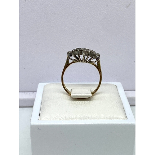 44 - An 18ct yellow gold cluster dress ring, approx 0.60ct diamond, weight is 2.7 grams, size F